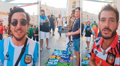 Argentinos venden en Qatar camisetas de Maradona y de Messi